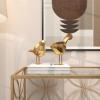 imageCosmoLiving by Cosmopolitan Polystone Bird Decorative Sculpture Home Decor Statues with Origami Accents Set of 2 Accent Figurines 7quot 8quotH GoldGold