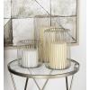 imageDeco 79 Metal Indoor Outdoor Candle Lantern Cage Style Decorative Lantern Candle Holder Set of 3 Lantern 11quot 9quot 6quotH Silver
