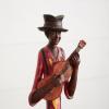 imageDeco 79 Polystone Musician Decorative Sculpture Tall Long Legged Jazz Band Home Decor Statues with Black Base Stand Set of 4 Accent Figurines 5quotW 40quotH BrownBrown