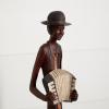 imageDeco 79 Polystone Musician Decorative Sculpture Tall Long Legged Jazz Band Home Decor Statues with Black Base Stand Set of 4 Accent Figurines 5quotW 40quotH BrownBrown