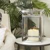 imageDeco 79 Stainless Steel Pillar Candle Lantern 10quot x 10quot x 21quot Silver