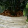 imageDeco 79 The Novogratz Faux Foliage Eucalyptus Artificial Plant with Realistic Leaves and Patterned Porcelain Pot 9quot x 9quot x 11quot Green