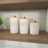 imageDeco 79 Ceramic Living Room Decorative Jars Textured Decorative Container with Wood Lids and Beaded Accents Set of 3 Jar with Lid 9quot 8quot 7quotH White