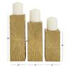imageCosmoLiving by Cosmopolitan Wood Geometric Carved Pillar Candle Holder Set of 3 12quot 10quot 8quotH GoldGold