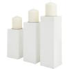 imageCosmoLiving by Cosmopolitan Wood Geometric Carved Pillar Candle Holder Set of 3 12quot 10quot 8quotH GoldWhite