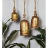 imageDeco 79 Gold Metal Tibetan Inspired Decorative Giant XL Cow Bells with Jute Hanging Rope Set of 3 10quot8quot6quotH  CylindricalDark Gold