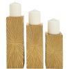 imageCosmoLiving by Cosmopolitan Wood Geometric Carved Pillar Candle Holder Set of 3 12quot 10quot 8quotH GoldGold