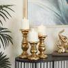 imageDeco 79 Mango Wood Decorative Candle Holder Distressed Turned Pillar Candle Stand Set of 3 Candlestick Holder 6quot 8quot 10quotH BlackGold