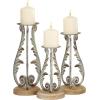 imageDeco 79 Polystone Decorative Candle Holder Tall Standing Candle Stand Candlestick Holder 8quot x 8quot x 22quot GoldSilver