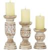 imageDeco 79 Wood Handmade Candle Holder with Carved Designs Set of 3 6quot 8quot 10quotH Beige