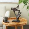 imageDeco 79 Resin Hands Open Sculpture with Butterfly and Copper Accents 8quot x 8quot x 5quot Dark BrownDark Brown