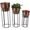imageDeco 79 Metal Indoor Outdoor Planter Wash Textured Large Planter Pot with Open Framed Black Caged Base Set of 3 Planters 33quot 28quot 22quot H BlackCopper