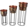imageDeco 79 Metal Indoor Outdoor Planter Wash Textured Large Planter Pot with Open Framed Black Caged Base Set of 3 Planters 33quot 28quot 22quot H BlackCopper