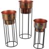 imageDeco 79 Metal Indoor Outdoor Planter Wash Textured Large Planter Pot with Open Framed Black Caged Base Set of 3 Planters 33quot 28quot 22quot H BlackCopper