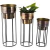 imageDeco 79 Metal Indoor Outdoor Planter Wash Textured Large Planter Pot with Open Framed Black Caged Base Set of 3 Planters 33quot 28quot 22quot H BlackGold