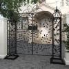 imageDeco 79 Metal Indoor Outdoor Scrollwork Arched Gate Garden Arbor with Vines and Latch Lock Closure 70quot x 15quot x 65quot Black70 x 15 x 65