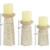 imageDeco 79 Mango Wood Floral Handmade Vine Decorative Candle Holder with Whitewashed Cream Backing Set of 3 Candlestick Holder 18quot 15quot 11quotH Brown6  8  9