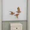 imageDeco 79 Polystone Bird Home Wall Decor Metallic 3D Sculpted Floating Wall Sculpture Set of 3 Wall Art 10quot10quot10quotH GoldGOLD
