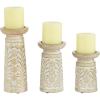 imageDeco 79 Mango Wood Floral Handmade Vine Decorative Candle Holder with Whitewashed Cream Backing Set of 3 Candlestick Holder 18quot 15quot 11quotH Brown6  8  9