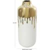 imageCosmoLiving by Cosmopolitan Ceramic Decorative Vase Centerpiece Vase with Abstract Gold Melting Drips Flower Vase for Home Decoration 15quot x 5quot x 11quot BlackWhite