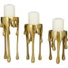imageCosmoLiving by Cosmopolitan Aluminum Metal Abstract Decorative Candle Holder Melting Drip Candle Stand Set of 3 Candlestick Holder 12quot 10quot 8quotH GoldGold