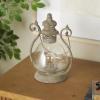 imageDeco 79 Metal Scroll Indoor Outdoor Candle Lantern Decorative Lantern Candle Holder with Arched Handle Lantern 9quot x 8quot x 12quot BronzeBronze