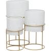 imageCosmoLiving by Cosmopolitan Metal Indoor Outdoor Planter Geometric Cutout Large Planter Pot with Circular Removeable Stands Set of 3 Planters 23quot 19quot 15quotH BlackWhite