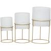 imageCosmoLiving by Cosmopolitan Metal Indoor Outdoor Planter Geometric Cutout Large Planter Pot with Circular Removeable Stands Set of 3 Planters 23quot 19quot 15quotH BlackWhite