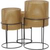 imageCosmoLiving by Cosmopolitan Metal Indoor Outdoor Planter Geometric Cutout Large Planter Pot with Circular Removeable Stands Set of 3 Planters 23quot 19quot 15quotH BlackGold