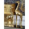imageCosmoLiving by Cosmopolitan Polystone Giraffe Decorative Sculpture Home Decor Statues Set of 2 Accent Figurines 12quot 15quotH GoldGold