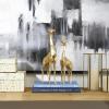 imageCosmoLiving by Cosmopolitan Polystone Giraffe Decorative Sculpture Home Decor Statues Set of 2 Accent Figurines 12quot 15quotH GoldGold