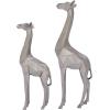 imageCosmoLiving by Cosmopolitan Polystone Giraffe Decorative Sculpture Home Decor Statues Set of 2 Accent Figurines 12quot 15quotH GoldSilver