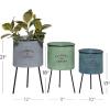 imageDeco 79 Metal Indoor Outdoor Planter Large Planter Pot with Flowers And Garden Text and Black Tripod Legs Set of 3 Planters 20quot 18quot 16quotH Multi Colored