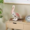 imageDeco 79 Polystone Pelican Decorative Sculpture Textured Home Decor Statue with Red Feathers and Round Blocks Accent Figurine 8quot x 4quot x 13quot RedRed
