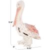 imageDeco 79 Polystone Pelican Decorative Sculpture Textured Home Decor Statue with Red Feathers and Round Blocks Accent Figurine 8quot x 4quot x 13quot RedRed