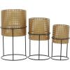 imageCosmoLiving by Cosmopolitan Metal Indoor Outdoor Planter Geometric Cutout Large Planter Pot with Circular Removeable Stands Set of 3 Planters 23quot 19quot 15quotH BlackGold