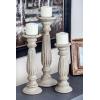 imageDeco 79 Mango Wood Decorative Candle Holder Distressed Turned Pillar Candle Stand Set of 3 Candlestick Holder 18quot 15quot 12quotH Beige