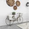 imageDeco 79 Metal Bike Indoor Outdoor Plantstand Indoor Outdoor Wire Floral Scrolled Plant Shelf with Basket and Saddle Bag Planters Plant Stand 56quot x 21quot x 31quot BrownBrown