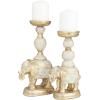 imageDeco 79 Polystone Elephant Candle Holder Set of 2 13quot 11quotH GoldGoldWhite