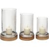 imageDeco 79 Wood Hurricane Lamp Pillar with Glass Candle Holders Set of 3 13 11 9quotH Brown