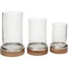 imageDeco 79 Wood Hurricane Lamp Pillar with Glass Candle Holders Set of 3 13 11 9quotH Brown