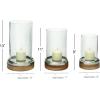 imageDeco 79 Wood Hurricane Lamp Pillar with Glass Candle Holders Set of 3 13 11 9quotH Brown