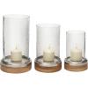 imageDeco 79 Wood Hurricane Lamp Pillar with Glass Candle Holders Set of 3 13 11 9quotH Brown