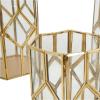 imageCosmoLiving by Cosmopolitan Metal Geometric Diamond Patterned Hexagon Candle Lantern with Clear Glass Set of 3 10quot 8quot 7quot H Gold