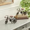 imageDeco 79 Metal Bike Decorative Sculpture Home Decor Statues with Wood Accents set of 2 Accent Figurines 10quot x 4quot x 7quot GoldBlack