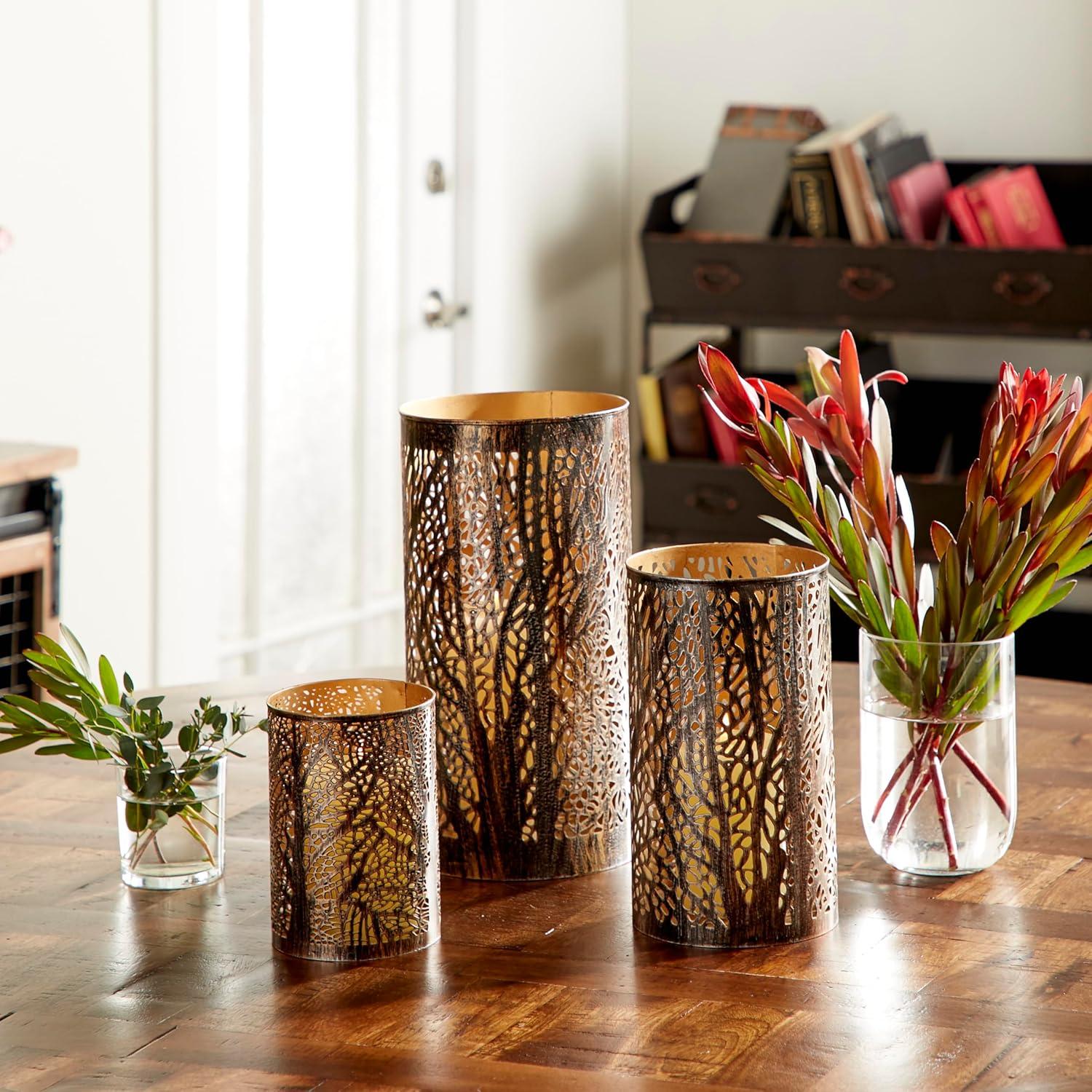 imageDeco 79 Metal Indoor Outdoor Candle Lantern Cutout Tree Branch Lantern Candle Holder with Gold Interior Set of 3 Lantern 12quot 9quot 5quotH Bronze12  9  5H