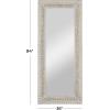 imageDeco 79 Mango Wood Scroll Vine Wall Mirror with Brown Carved Detail 36quot x 2quot x 84quot White