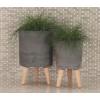 image:imageCosmoLiving by Cosmopolitan Magnesium Oxide Geometric Indoor Outdoor Planter Hexagon Large Planter Pot with Brown Wooden Legs Set of 2 Planters 15 17H WhiteBlack