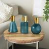 image:imageDeco 79 Glass Geometric Tinted Vase with Gold Rim and Varying Shapes Set of 3 898 H BlueBlue