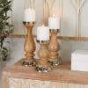 image:imageThe Novogratz Wood Candle Holder Set of 3 12 10 8 H Silver